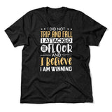 I Did Not Trip And Fall, I Attacked The Floor Men/Unisex T-Shirt in Heather Black color