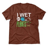 I Wet My Plants Men/Unisex T-Shirt in Heather Clay color