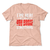 I'm Here Because You Broke Something Men/Unisex T-Shirt in Heather Peach color